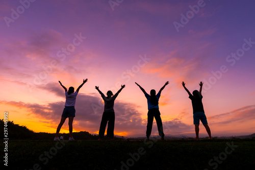 Group of healthy girl show hands with sunset background.Healthy exercise lifestyle concept.