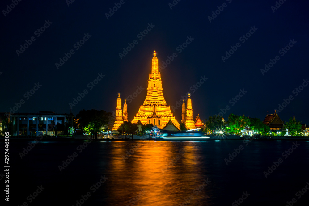 Wat Arun Temple at night with blue sky in Bangkok  Thailand.Photo by long exposure.