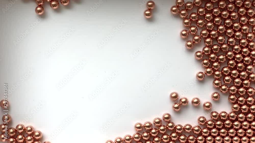 The chaotic motion of many golden iron balls. Fast motion. Time lapse. The chaotic motion of many golden iron balls. Fast motion. Time lapse.