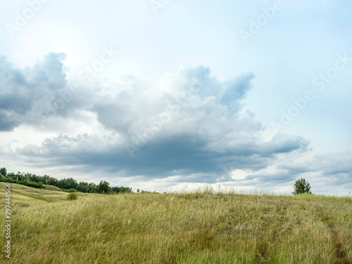 autumn landscape of fields and large Cumulus clouds