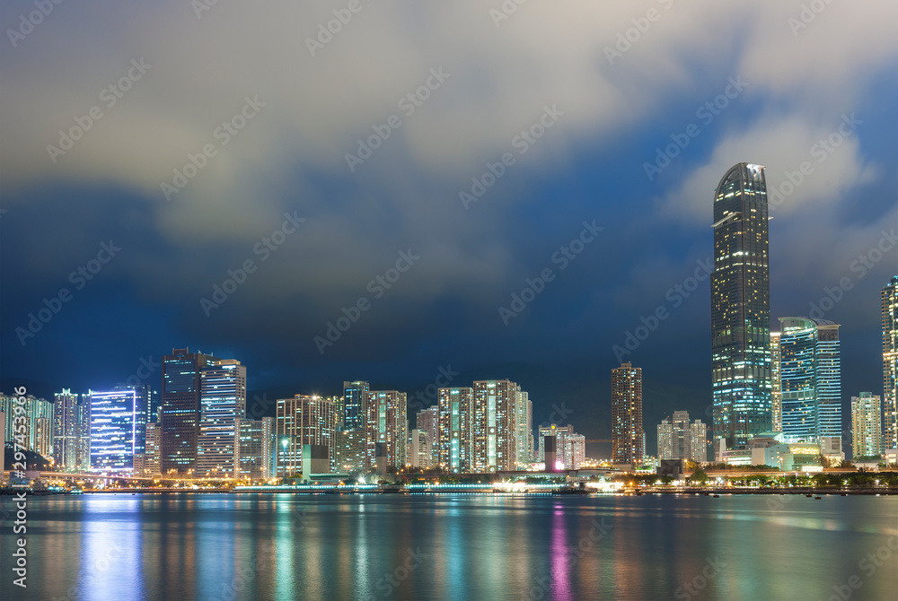 Fototapeta Skyline and harbor of Hong Kong city at night