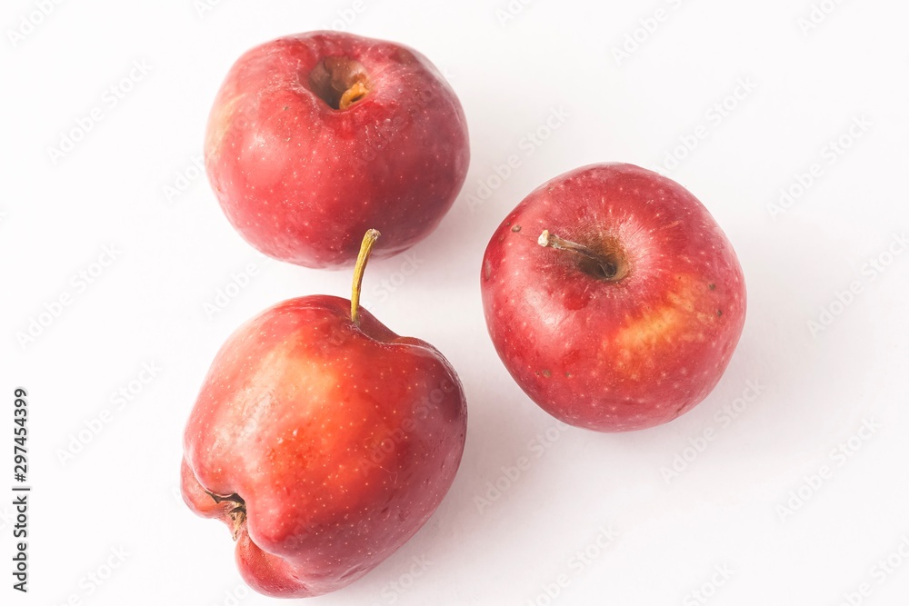 Red apples isolated against white Red apples isolated against white