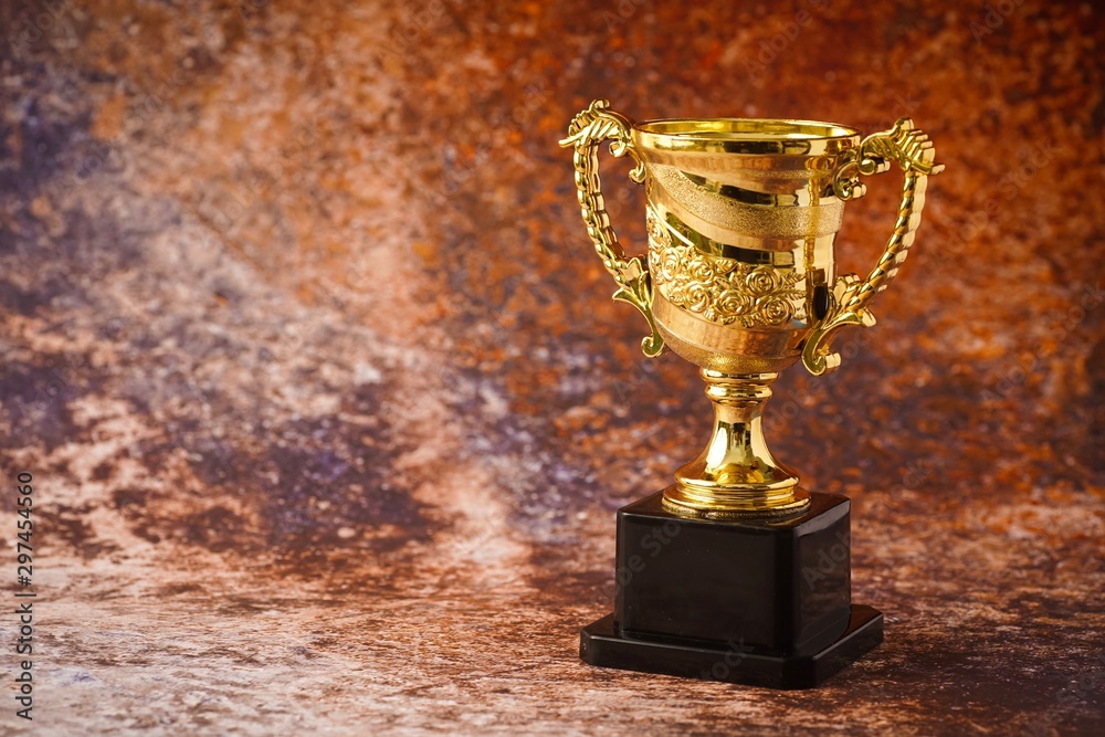 Isolated shot of trophy replica, success concept Isolated shot of trophy replica, success concept