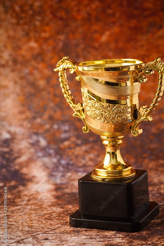 Isolated shot of trophy replica, success concept Isolated shot of trophy replica, success concept