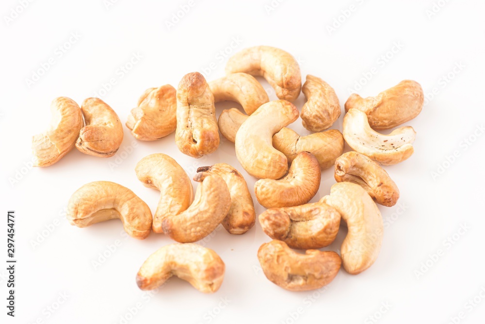 Cashew nuts isolated against white Cashew nuts isolated against white