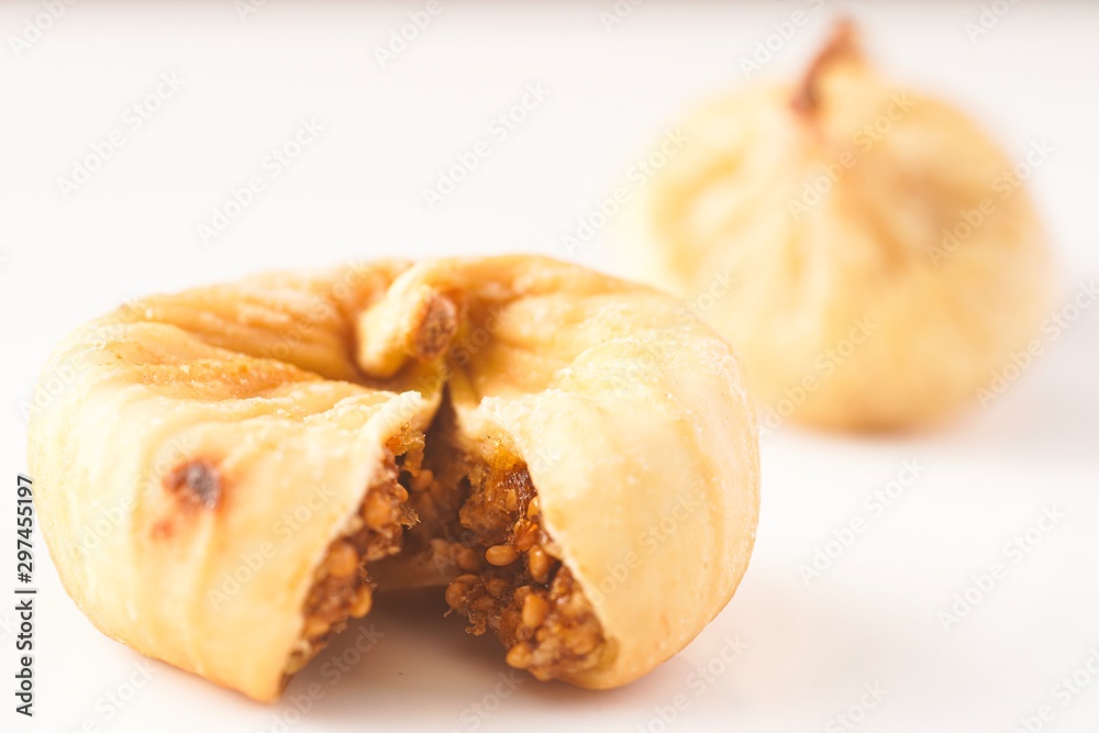 Dried figs isolated against white Dried figs isolated against white
