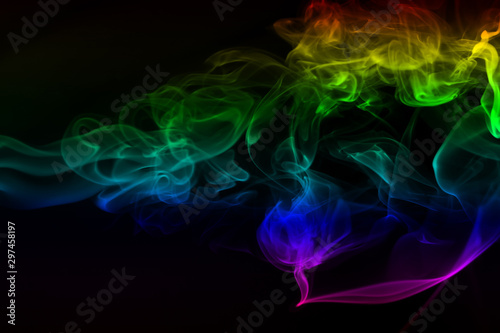 Beautiful colorful smoke abstract on black background, Moving of fire design