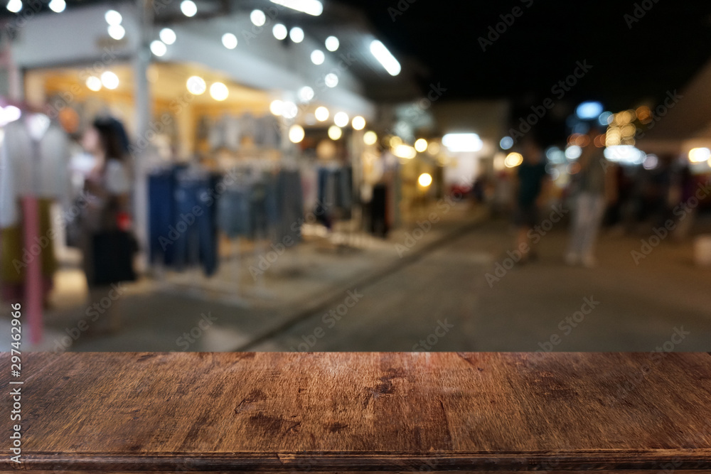 Empty dark wooden table in front of abstract blurred bokeh background of restaurant . can be used for display or montage your products.Mock up for space. Empty dark wooden table in front of abstract blurred bokeh background of restaurant . can be used for display or montage your products.Mock up for space.