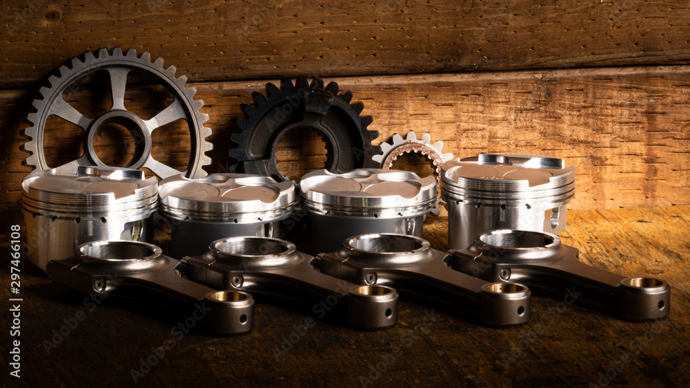 motorcycle engine parts on a workbench with some tools