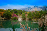 Mountain lake Shaan-kaya, Crimea. Very beautiful mountain lake, against the backdrop of the mountains, autumn landscape. For calendars, cards, design. Landscape, autumn, autumn forest.Reflection in