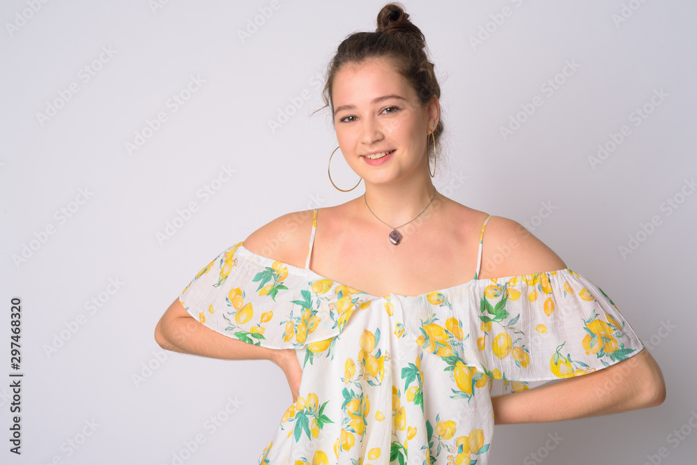 Obraz premium Portrait of happy young beautiful woman smiling