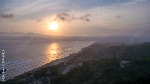 Timelapse of beautiful sunset from hill, with beach view