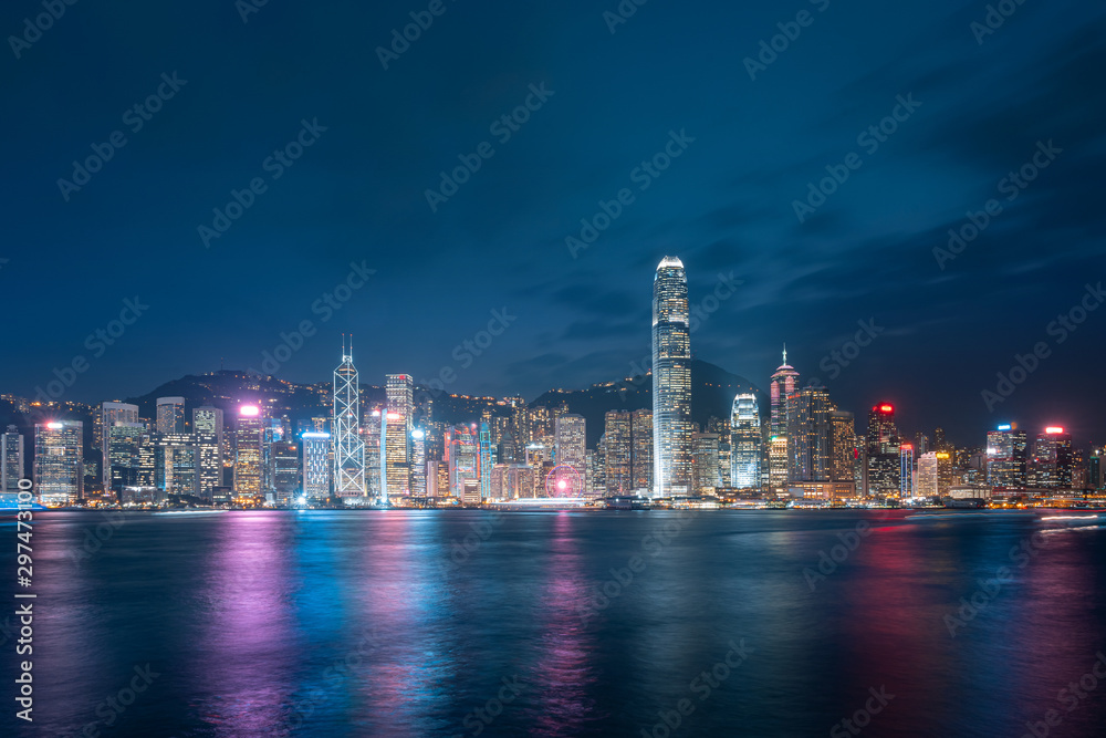 Cityscape and skyline at Victoria Harbour in Hong Kong city at Night