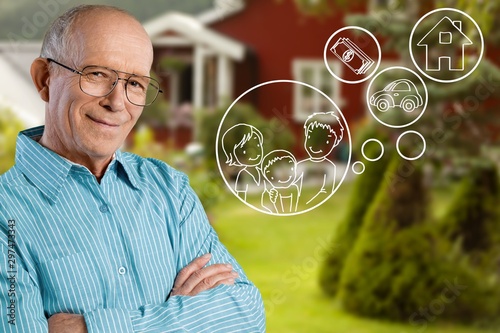 Happy senior man in blue shirt