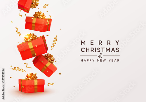 Merry Christmas and Happy New Year. Realistic red gift boxes. Falling shiny golden confetti isolated on white background. Bright festive tinsel of gold color. Xmas present