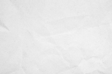 White recycled craft paper texture as background. Grey paper texture, Old vintage page or grunge vignette. Pattern rough art creased grunge letter. Hardboard with copy space for text.