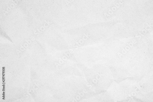 White recycled craft paper texture as background. Grey paper texture  Old vintage page or grunge vignette. Pattern rough art creased grunge letter. Hardboard with copy space for text.