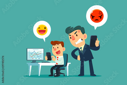 businessman texting while at work with his angry boss stand behide him