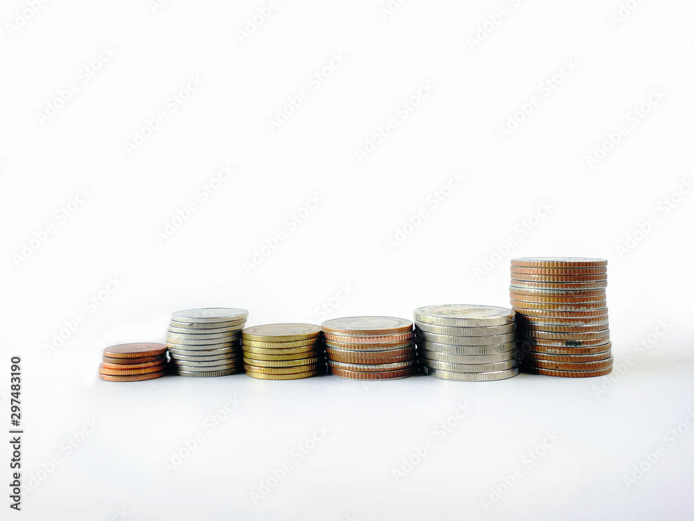 Overlay many coins like graph on white background for financial concept.