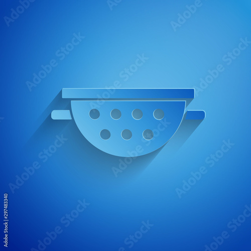 Paper cut Kitchen colander icon isolated on blue background. Cooking utensil. Cutlery sign. Paper art style. Vector Illustration