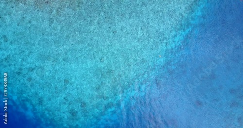 Wallpaper Mural birds eye point of view of tropical scenery, open water with sun reflection off the coast of the Bahamas Torontodigital.ca