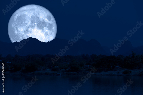 super full fish moon back on cloud and mountain on night sky