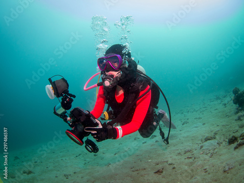 Scuba diver doing underwater photography in Anilao Philippines © yooranpark