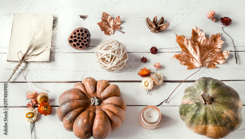 Autumn background with different objects and pumpkin. Flat-lay. © puhimec