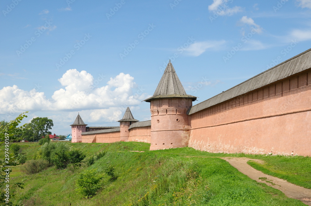 Summer view of the walls and towers of the Spaso-Evfimiev monastery. The city of Suzdal. The Golden ring of Russia