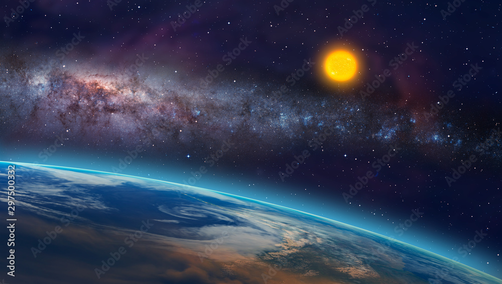 View of the planet Earth from space during a sunrise against milkyway galaxy and sun