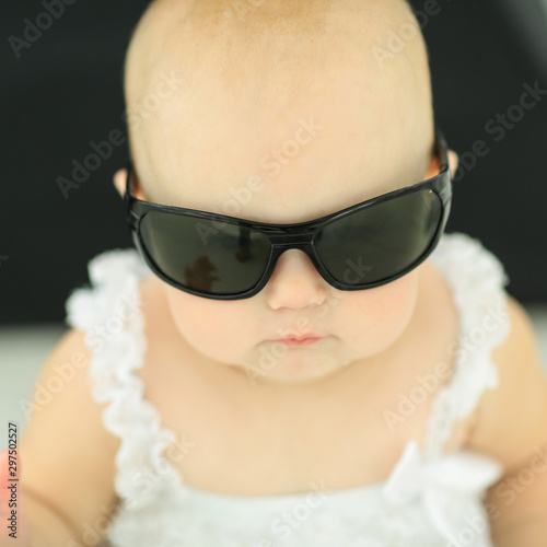 closeup.portrait of little baby with sunglasses. concept of childhood