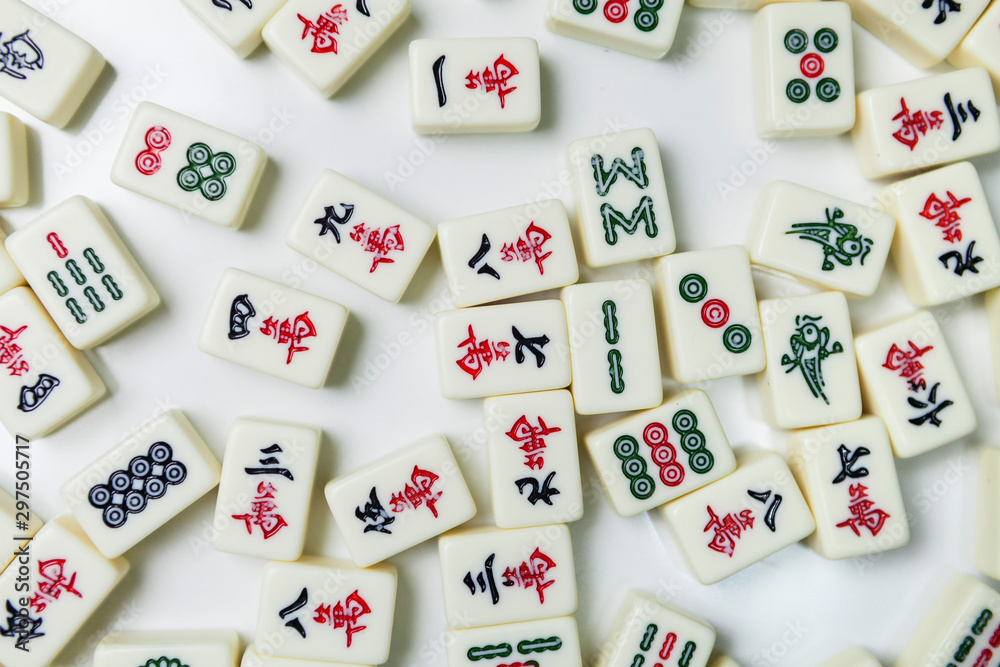 Pile of Mahjong ancient asian game on the white background Pile of Mahjong ancient asian game on the white background