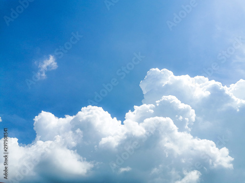 Fototapeta Naklejka Na Ścianę i Meble -  White fluffy clouds with blue sky background.