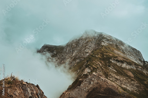 Fototapeta Naklejka Na Ścianę i Meble -  High mountains in the clouds