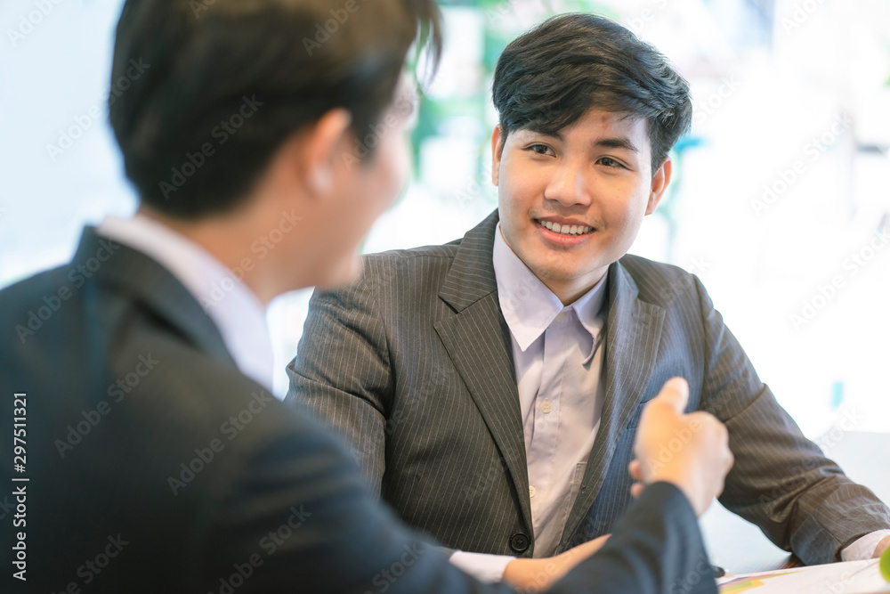 Close up of Businessmen discuss information or brainstorm metting in a business working space. Close up of Businessmen discuss information or brainstorm metting in a business working space.