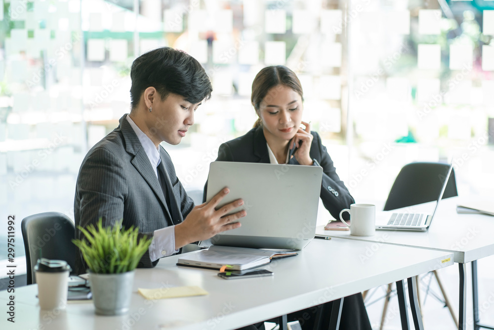 businessman and businesswoman discussing project at meeting. Business analysis and consaulting concept. businessman and businesswoman discussing project at meeting. Business analysis and consaulting concept.