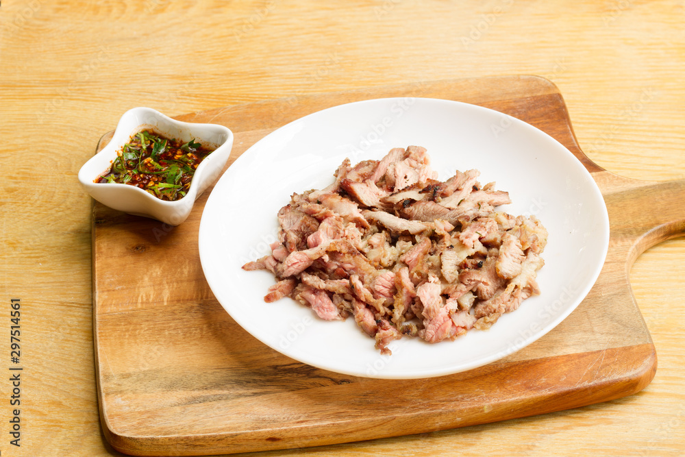 Grilled beef on white plate and space for text input. Grilled beef on white plate and space for text input.