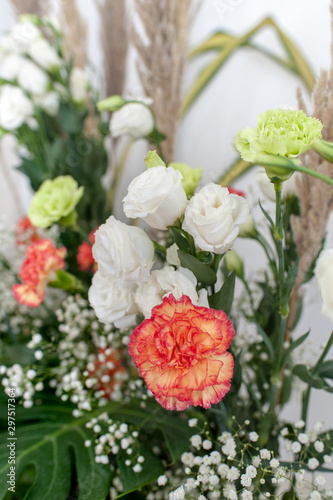 Bouquet of roses  red white flowers  inside the wedding For arranging the atmosphere of the wedding to look elegant  fresh flowers  beautiful bouquet Is another interesting business.