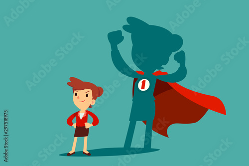 businesswoman with her shadow as superhero