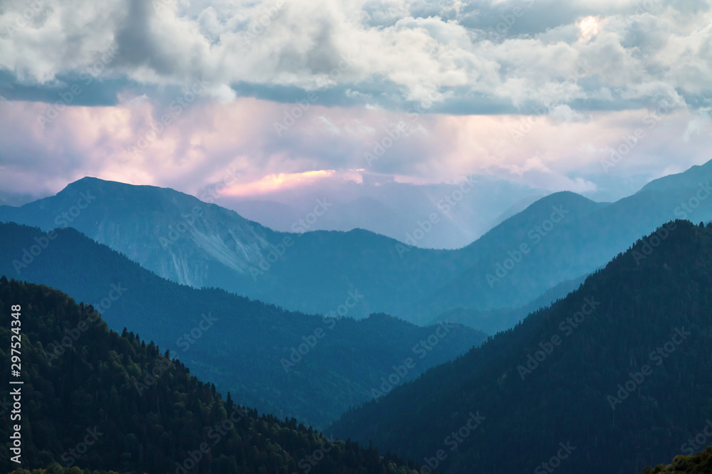 mountain landscape with sky and dark clouds