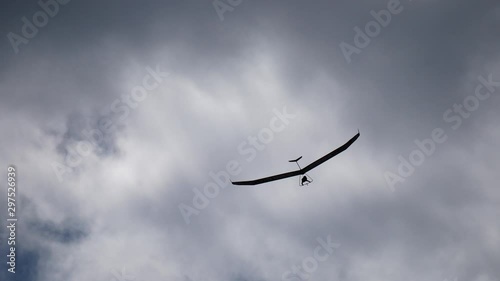 Campoli Appennino, Abruzzo, Lazio and Molise National Park, Italy - october 12 2019: A hang glider flies in the cloudy sky photo