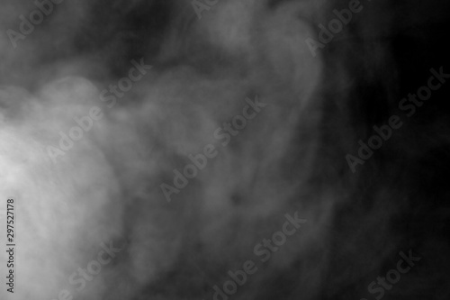 Abstract powder or smoke isolated on black background,Out of focus