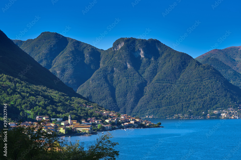Panoramic view of Lake Como. Lombardy, Italy. Autumn season. Perfect clear blue sky.