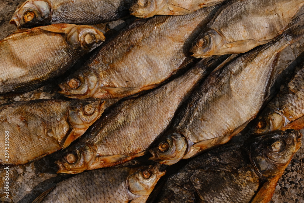 conceptual flat background of dried fish. vobla conceptual flat background of dried fish. vobla