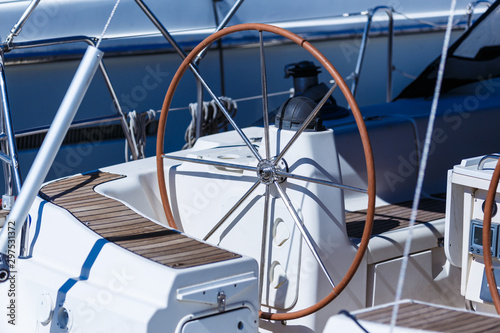 A modern speed boat yacht steering wheels. Background. © vladimircaribb