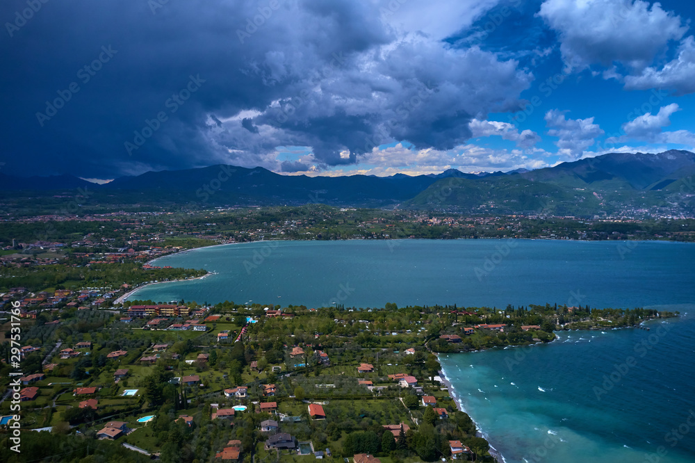 Aerial photography with drone, Rocca di Manerba in Garda lake, Italy.