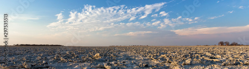 Sunset over dry salt pan in Botswana