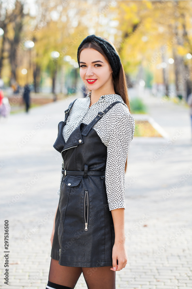 Portrait of a young beautiful woman in black dress Portrait of a young beautiful woman in black dress