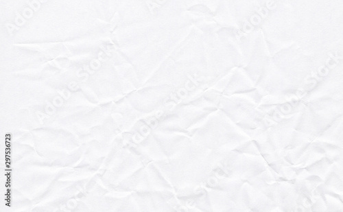 Closeup crumpled white paper texture background, texture. White paper sheet board with space for text ,pattern or abstract background..