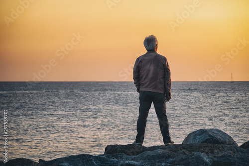 Middle Aged Man Watching The Sea Standing